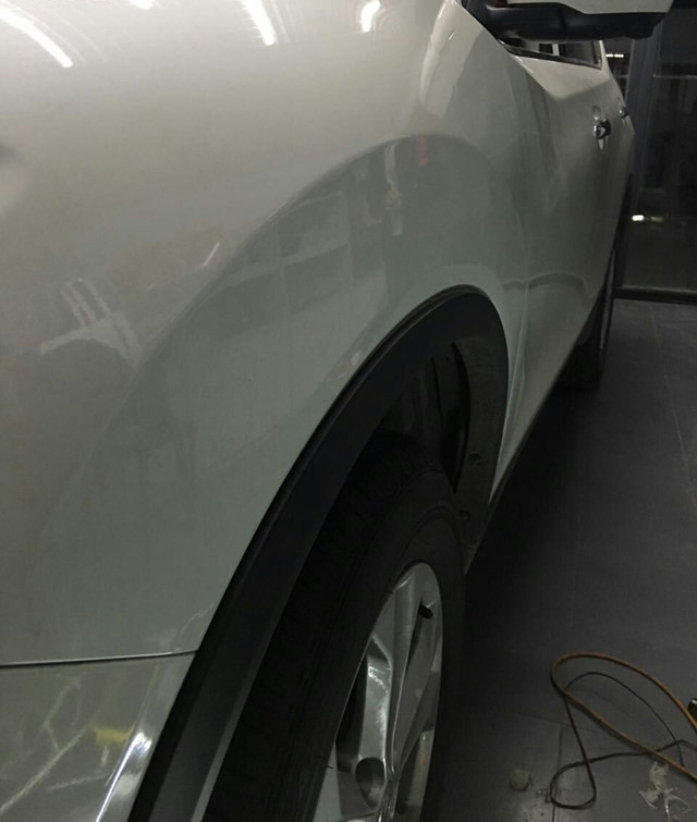 汽車前翼子板凹陷修復后 汽車前翼子板凹陷修復后